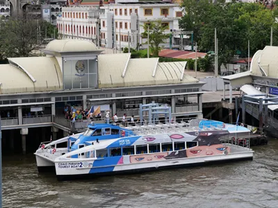 Bangkok, Thailand - The River Boat Taxi Station at Saphan Taksin Station to Wat Arun Ratchawararam Ratchawaramahawihan, or simply Wat Arun, the Temple of Dawn