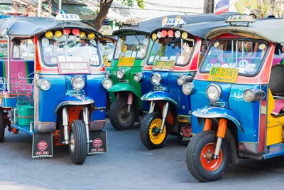 Bangkok, Thailand - Tuk Tuks lined up ready for hire