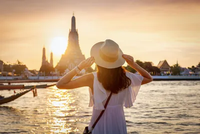 Bangkok, Thailand -A view from across the river to the Wat Arun Ratchawararam Ratchawaramahawihan, or simply Wat Arun, the Temple of Dawn